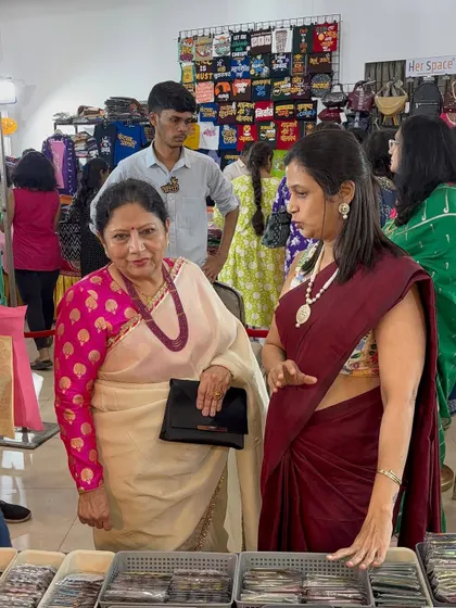 Another candid moment from the Dadar exhibition, discussing the different designs and customization options available.