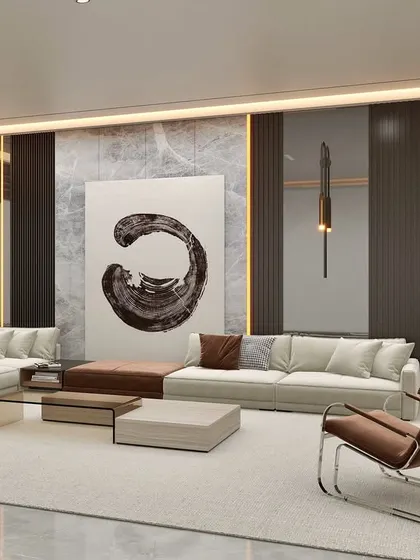 This living room is a study in balanced minimalism. A low-slung modular sofa and a classic cantilever chair are arranged to create an open, uncluttered space, allowing the large-scale abstract artwork to serve as the primary focal point.