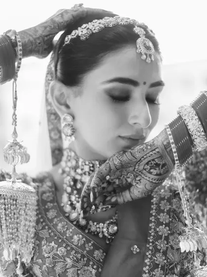 A beautiful black and white shot of the bride during her getting ready process. Monochrome brings a timeless, emotional quality to these moments.
