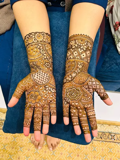 A beautiful design for a client, with intricate patterns covering the hands and forearms.