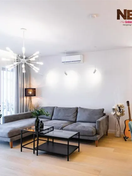 Another view of a living room concept, showing how an L-shaped sofa can maximize seating in a compact space.
