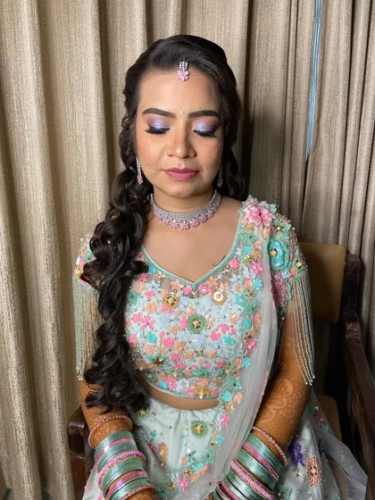 The complete look with hair and makeup. The soft curls and pastel makeup create a dreamy, romantic vibe.