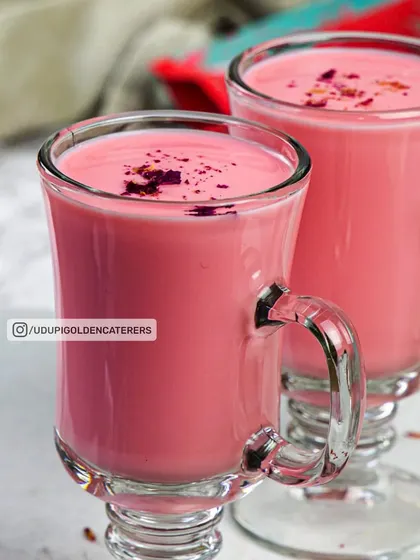 This is our fragrant Rose Milk, a sweet and aromatic beverage that is both visually appealing and delicious. It's a popular choice for weddings and festive occasions.