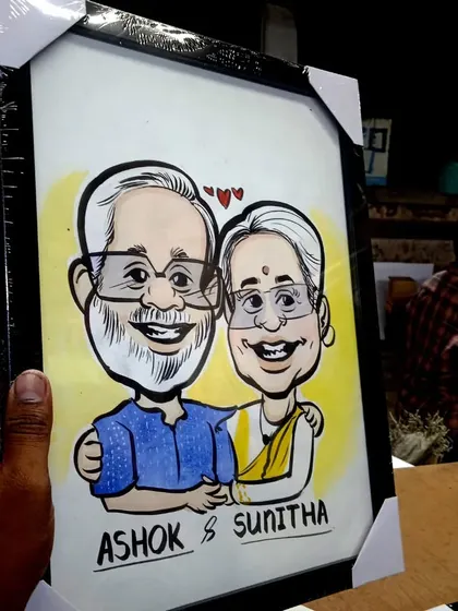 This framed piece shows a smiling couple, created as a custom gift. The bold lines and bright colors are characteristic of my watercolor style.