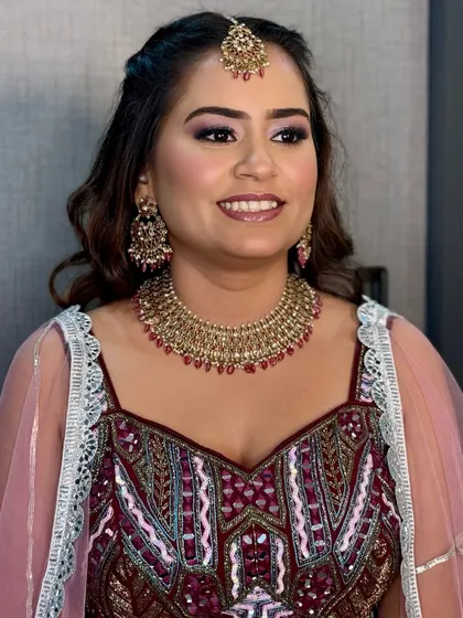 Bringing out the bride's inner glow for her engagement. This soft glam look features a touch of shimmer on the eyes and radiant skin.