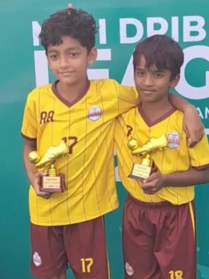 Two of our U9 players with their Man of the Match awards from the Mini Dribblers League.