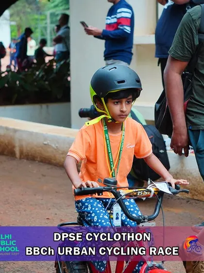 A young participant navigates the course at the DPSE Cyclothon. Safety is my top priority, with helmets being mandatory for all riders in every category.