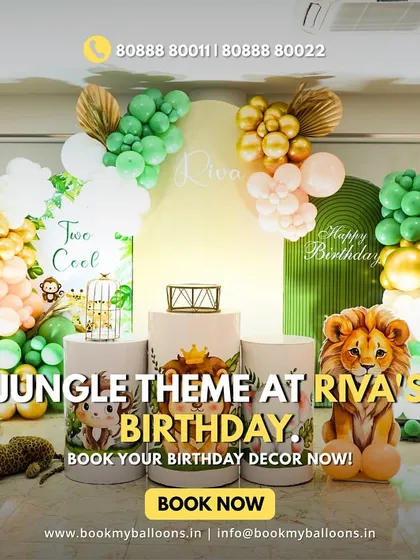 Riva's jungle theme birthday was a wild and fun affair. The setup included a variety of animal props like a baby elephant and a tiger, set against a backdrop of lush green and gold balloons.