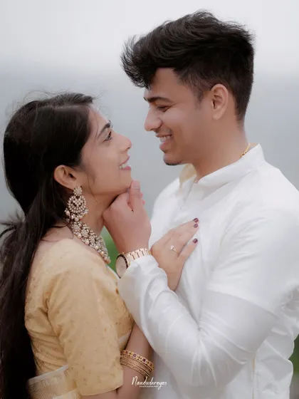 A sweet close-up of a couple, capturing their smiles and the genuine affection in their eyes.