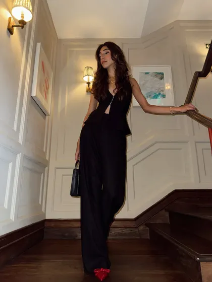 Another shot on the stairs. I love how the red shoes stand out against the black outfit.