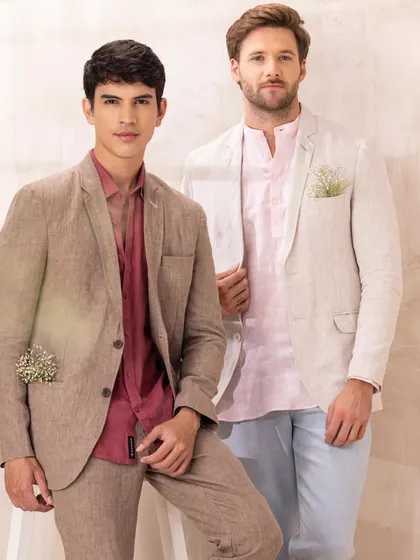 For a destination or summer wedding, linen is the perfect choice. Here, I've styled two coordinated looks featuring linen blazers and kurtas in earthy tones for a relaxed yet sophisticated vibe.