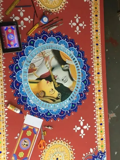 A behind-the-scenes shot of the workspace where we create our Lippan art. We use a combination of digital references and traditional handcrafting techniques to bring our designs to life.