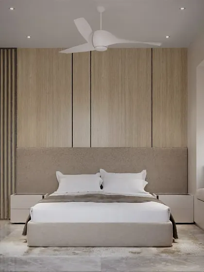 A calm and balanced bedroom design using natural wood tones. The headboard wall is paneled with a mix of fluted and smooth wood textures, creating a subtle yet sophisticated backdrop.