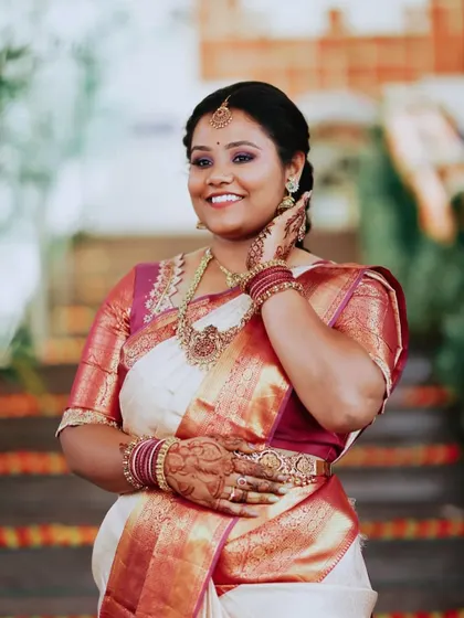 A happy, candid shot of Meghana. The makeup is designed to look great in photos and last throughout the event.