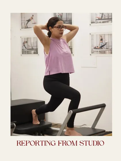 Reporting from the studio. This client is in a deep lunge on the reformer, building leg strength and stability.