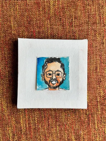 A tiny watercolour caricature of my friend Sourabh. I love our creative conversations, and I tried to capture his artistic soul in this portrait.