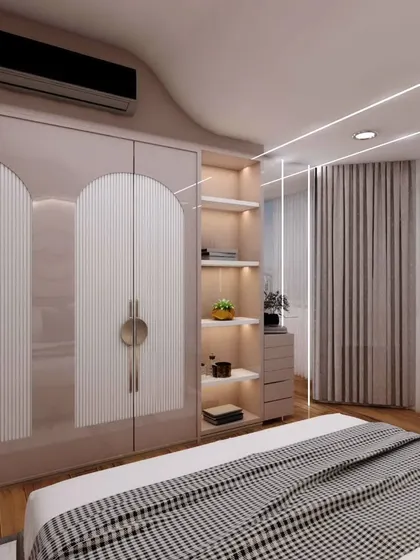 Another angle of the daughter's bedroom, showing the arched wardrobe design that mirrors the headboard. The fluted details and custom handles add a sophisticated touch.
