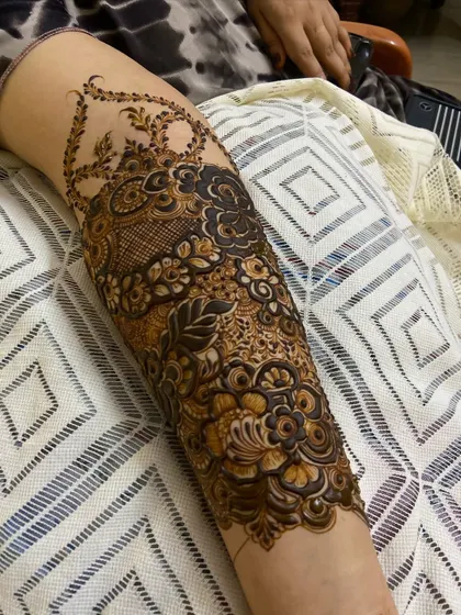 This is a detailed view of my intricate bridal henna work. Each design is unique, combining traditional patterns like paisleys and mandalas with fine-line fillers to create a stunning, full-coverage look for your special day.