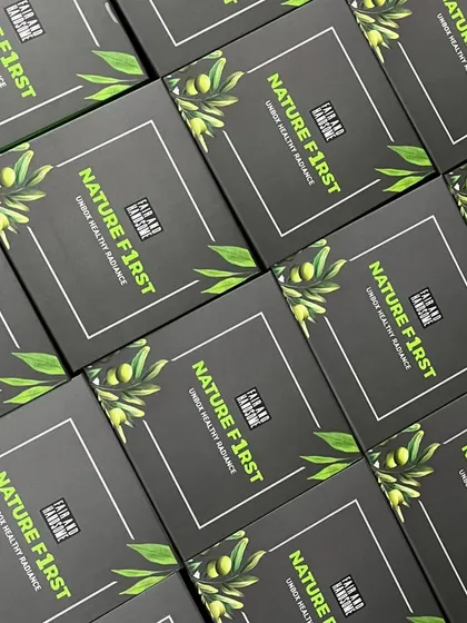 Another shot of the sleek, custom-made boxes for the male grooming hampers, showing off the clean design and branding.