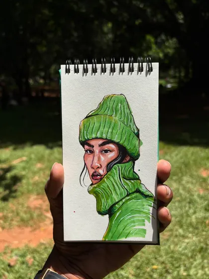 This piece, drawn in my sketchbook, shows the vibrant results I get with alcohol markers. I love how the bright green pops, creating a custom portrait that’s full of life and personality.