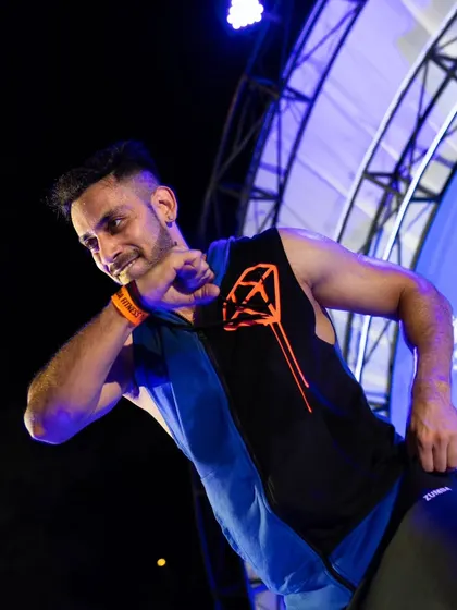 Mistakes are proof that you are trying. A candid shot of me in the middle of a move on stage at the Active Noida event. It's all about learning, growing, and evolving together without fear of judgment.