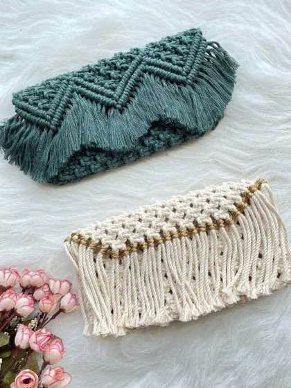 Two of my fringe clutch designs, perfect for a night out. One features a teal chevron pattern, while the other has delicate gold thread woven into a cream-colored base.