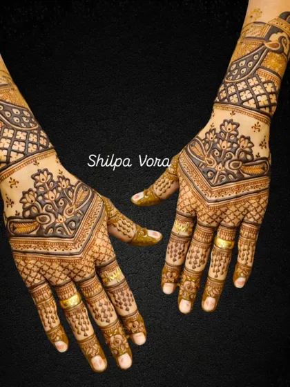 A contemporary design with a V-shaped layout and a mix of paisley and floral elements.