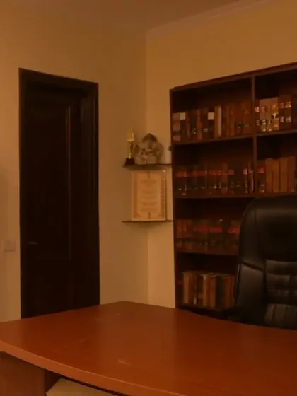 The library and desk at my Delhi office, the hub of our legal practice.