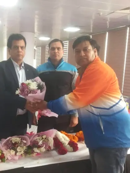 Receiving a floral welcome from officials at the SGFI Delhi trials.