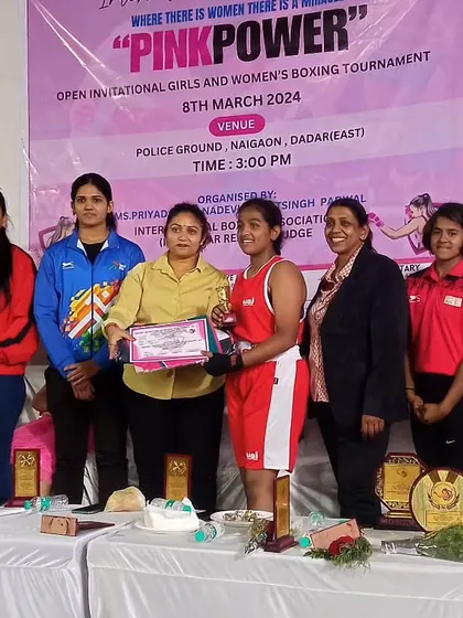 Another one of our junior girls celebrating her victory at the women's tournament. The future of women's boxing is strong here.