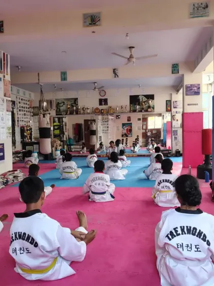 A view from the back of the dojang during a meditation session.