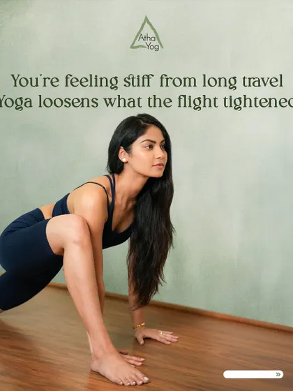 Feeling stiff from long travel? This image shows a low lunge, a perfect pose to loosen what the flight tightened. Yoga is your tool for post-travel recovery.