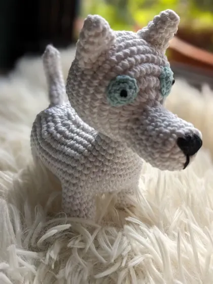 A closer look at 'Chase', the white dog from the custom pet pair, showing his unique blue-rimmed eyes.