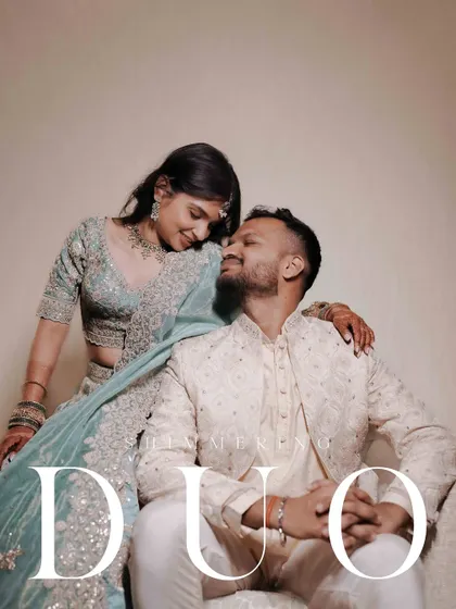 A sweet portrait of the engaged couple, titled "Duo." The image captures their comfortable and affectionate bond as they look at each other.