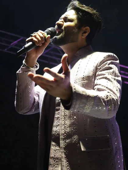 A close-up of me singing a powerful note, fully immersed in the performance.