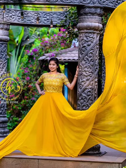 The flowing trail of the yellow gown creates a stunning visual effect in this shot. I offer a wide selection of these gowns for rent in Bangalore.