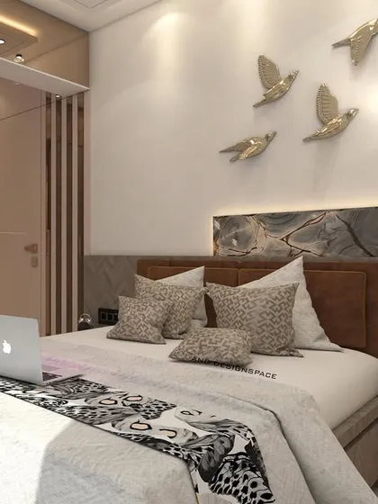 A master bedroom concept for a 3BHK in Bhayandar, featuring a marble-patterned headboard wall and decorative bird accents. The design includes a full-length wardrobe and an integrated study nook.
