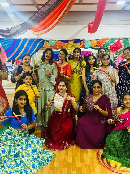 Our ladies looking stunning in their traditional attire for the Dandiya celebration. It's a night of color, music, and community.