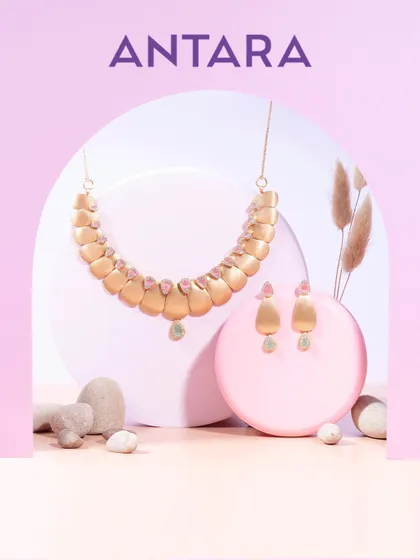 Petal-like forms, a satin-soft glow, and gems that shimmer like whispered secrets. This 22kt matte gold set with morganite and aquamarine is an elegant and unique gift for someone special.