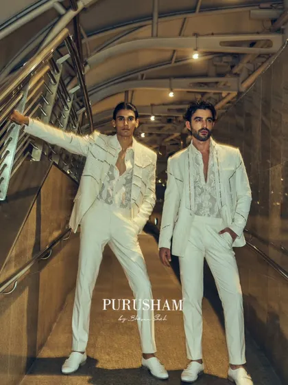 My 'Late CheckOut' collection is about owning the night. Here, two models showcase the power of a coordinated all-white look, proving that leaving an impression is non-negotiable.