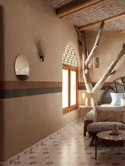 This side view shows how the integrated tree element, wall textures, and *jali* window come together to create a cohesive and nature-inspired interior. The design is all about creating a holistic, sensory experience.