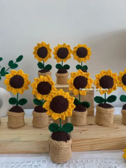 A field of my potted crochet sunflowers, all lined up and ready to go. This was for a large bulk order for event return gifts.