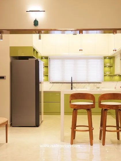 A view from the living area into the Calicut kitchen, showing the open and inviting layout perfect for modern lifestyles.