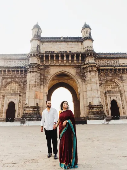 Capturing a love story with Mumbai's iconic Gateway of India as the witness. This kind of shot blends your personal journey with the grandeur of the city, creating a powerful and memorable pre-wedding photograph.