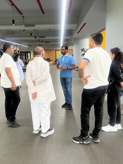 Our team briefs distinguished guests during a tour of our state-of-the-art gym and high-performance center.