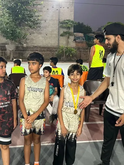Giving feedback and encouragement to our young players after the game.