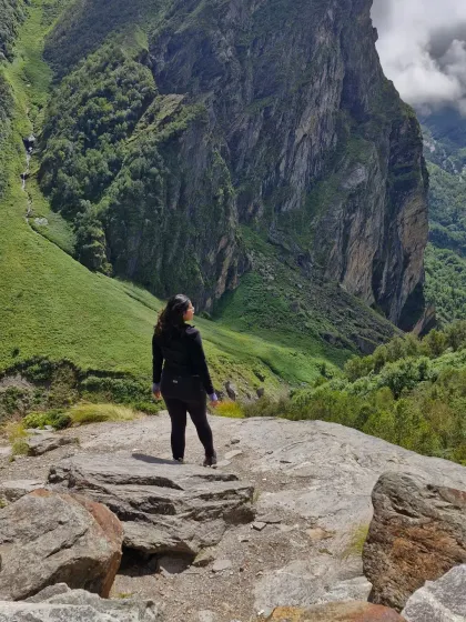 Overlooking a vast green valley. Moments like this are why I trek. It's a feeling of being small in the face of nature's grandeur, which is both humbling and empowering.