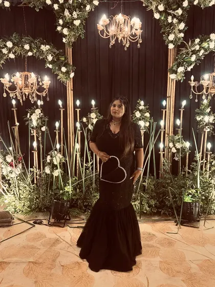 A final shot of the client in her black fish-cut gown. She looks absolutely beautiful and confident.