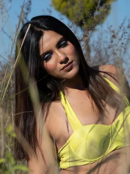 Another shot from the outdoor editorial. The sunlight brings out the beautiful glow in the skin and the subtle details of the makeup.