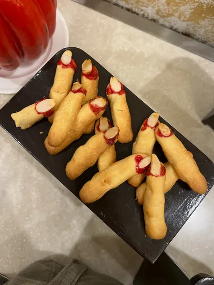 Creepy and delicious "witch finger" cookies, complete with an almond fingernail. These were so much fun to make for a Halloween catering order.